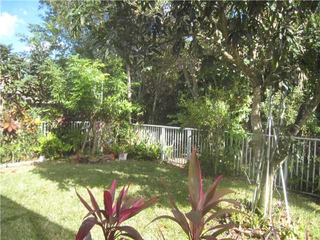back yard fenced in back yare and extended patio.